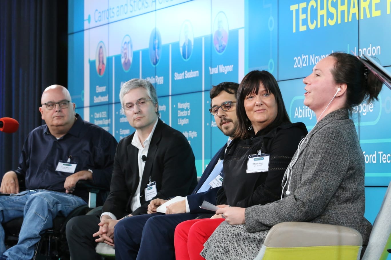 Panelists on stage at TechShare Pro, giving a global perspective on accessibility