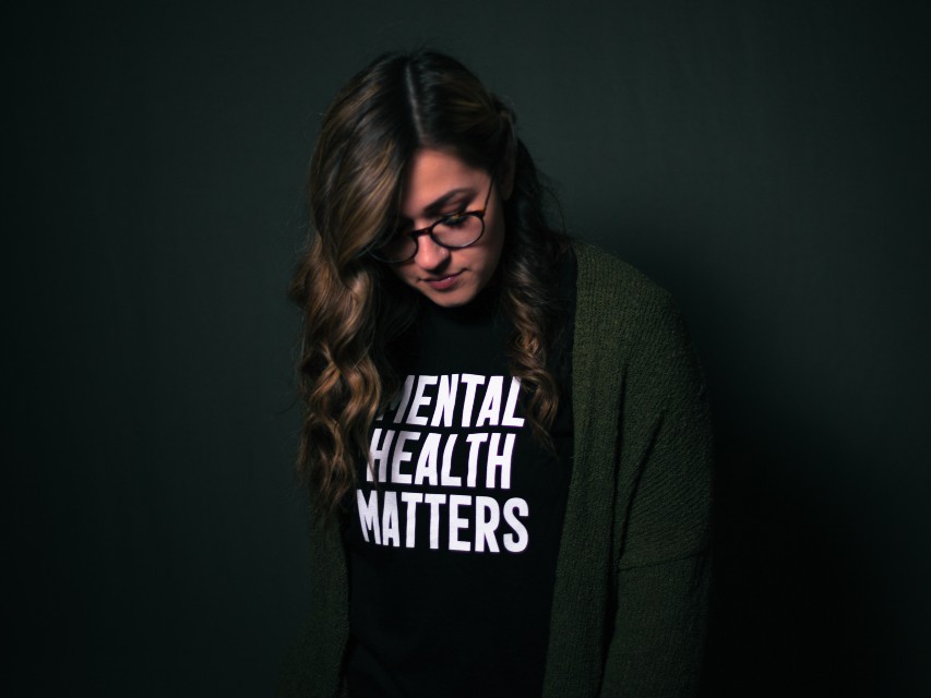 Woman wearing tshirt that reads Mental Health Matters