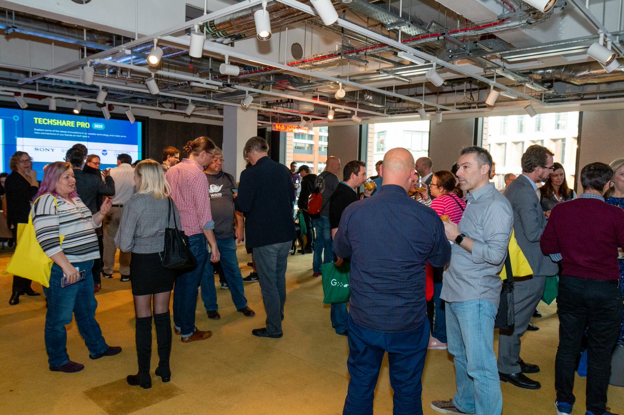 Image shows people networking in the shared space at TechShare Pro 2019