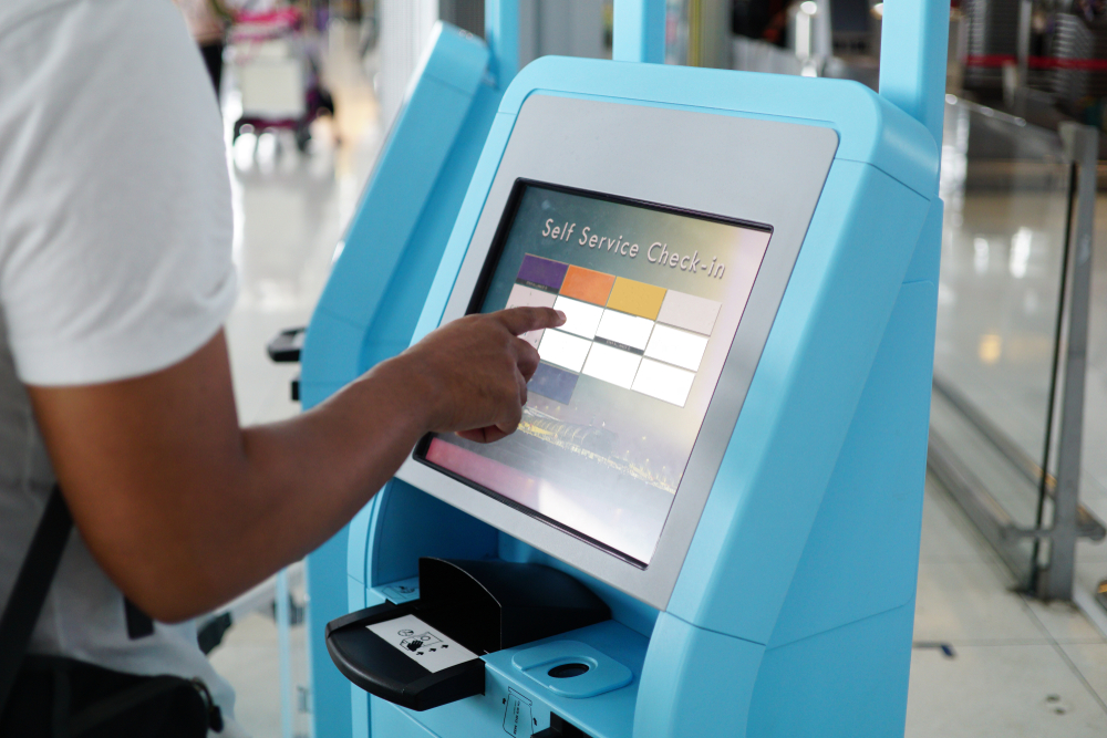 Person using airport self check-in